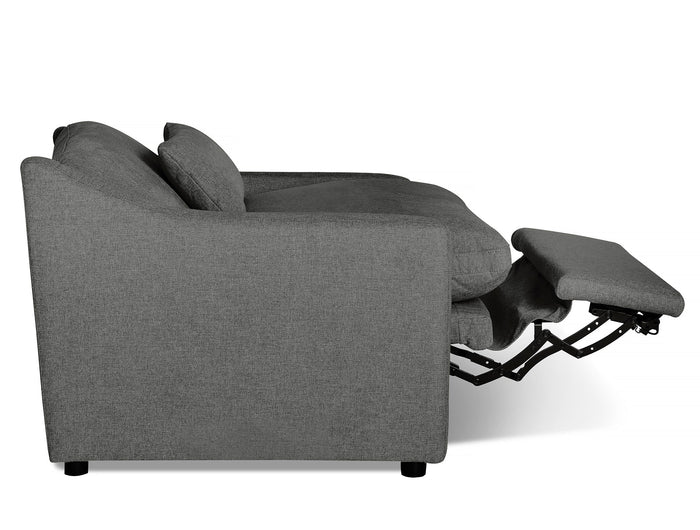 Gray reclining sofa, side view, with extended footrest. Plush cushions and sleek design on dark square legs, showcasing comfort and style against a white background.