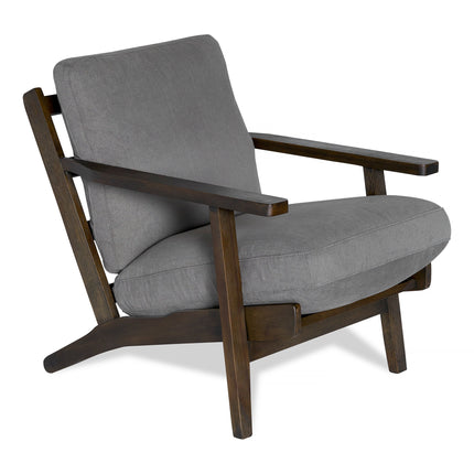 A modern armchair with a wooden frame and cushioned seat and backrest, upholstered in gray fabric. The chair features wide armrests and an angled backrest.