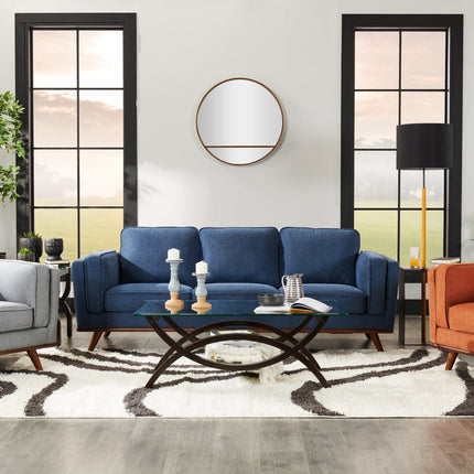A mid-century modern sofa with orange upholstery and three cushions. It features wooden legs and a sleek, minimalist design.