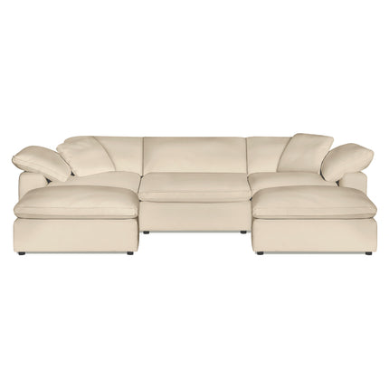 The Peyton 3 Piece Straight + 2 Ottomans offers luxury with its spacious beige sectional design, plush down and feather cushions, and wide armrests. Its modern style adapts to any space, set against a plain white background.