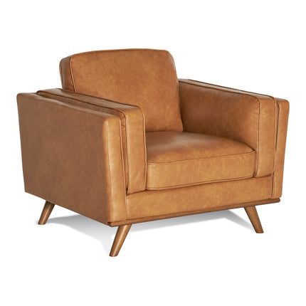 The Maddox Chair is a mid-century modern armchair with a tan leather finish, wooden tapered legs, clean lines, and a boxy shape. Part of the Maddox Sofa Set, it offers plush cushions for enhanced comfort.