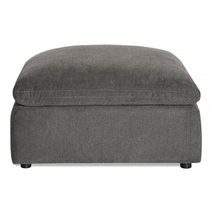The My Cloud Slope 40 Ottoman offers large, square gray comfort with its cushioned top. It features a sleek fabric finish and short black legs, making it perfect customizable furniture for any living room or lounge with its simple, modern design.