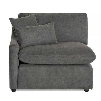 The My Cloud Slope Left Arm is a modular corner chair with a plush seat, two cushions, and an angled left armrest in dark gray fabric. It boasts small black feet and suits any elegant living space.