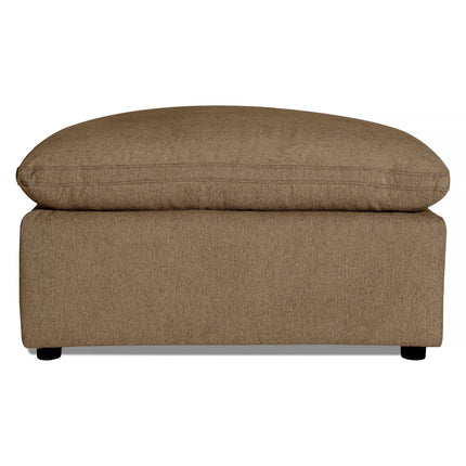 The My Cloud 40 Ottoman is a brown, textured cushioned piece with a simple rectangular design and four black legs, exuding cozy and comfortable vibes.