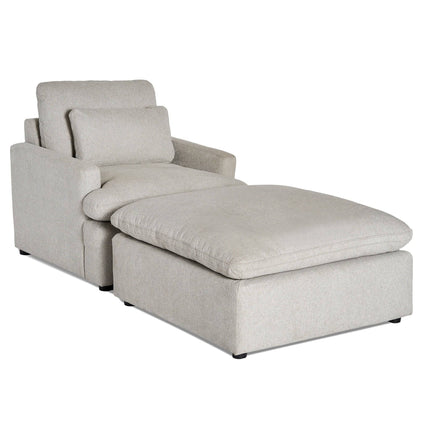 Introducing the My Cloud Chair: an upholstered light gray chaise lounge with cushioned backrest and armrests. Its plush, elongated seat cushion provides unparalleled comfort, and its customizable design makes it perfect for any stylish living space.