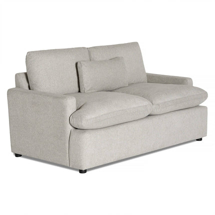 Discover the My Cloud Loveseat: a light gray, two-seater sofa with cushioned seat, backrest, and armrests. It includes a small matching throw pillow in the center. This customizable piece boasts a minimalist design with dark feet peeking below.