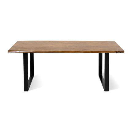 The Live Edge Dining Table is a rectangular wooden table with a smooth top and dark metal legs. Crafted from unique wood slabs, it has a natural finish and an inviting, minimalistic modern design.