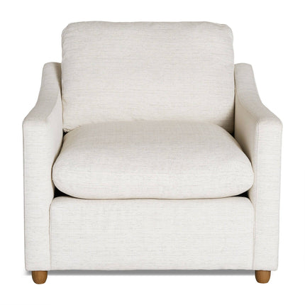 The My Cloud Slope Chair in beige features wooden legs and square arms for customizable comfort. Its plush backrest and soft, woven upholstery provide modern coziness, making it perfect for enhancing any living space with comfortable furniture.