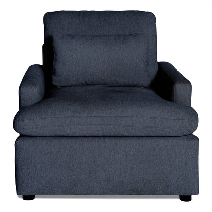 The My Cloud Chair is a dark gray upholstered armchair with wide armrests and a plush back cushion. Featuring soft, textured fabric and a comfortable seat cushion, this piece offers customizable furniture options in a modern, minimalist design.